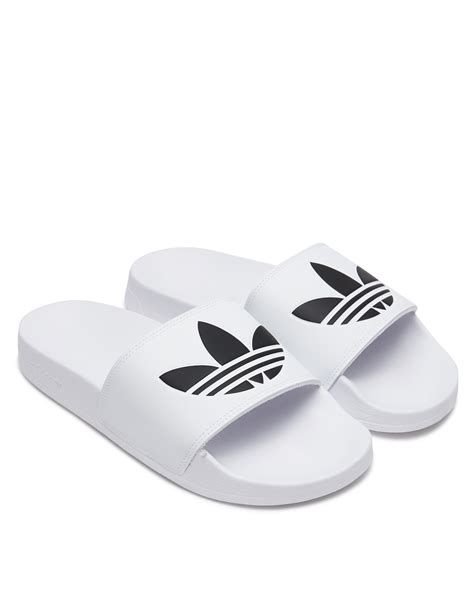 white Adidas slides women's